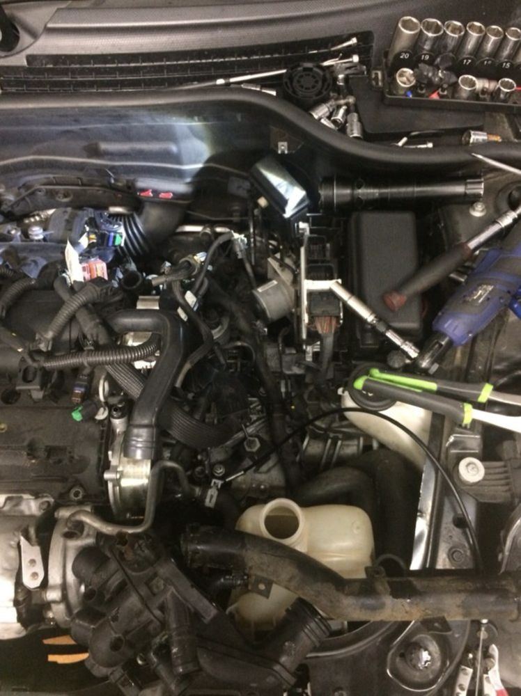 Cooling plumbing traced in an Erie engine bay
