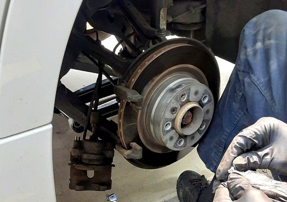 Wheel-off brake service at an Erie home