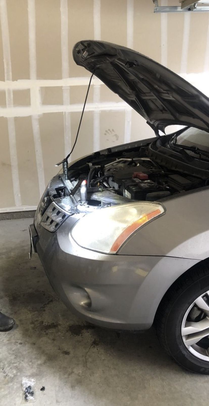 Working a no start under lights in an Erie garage
